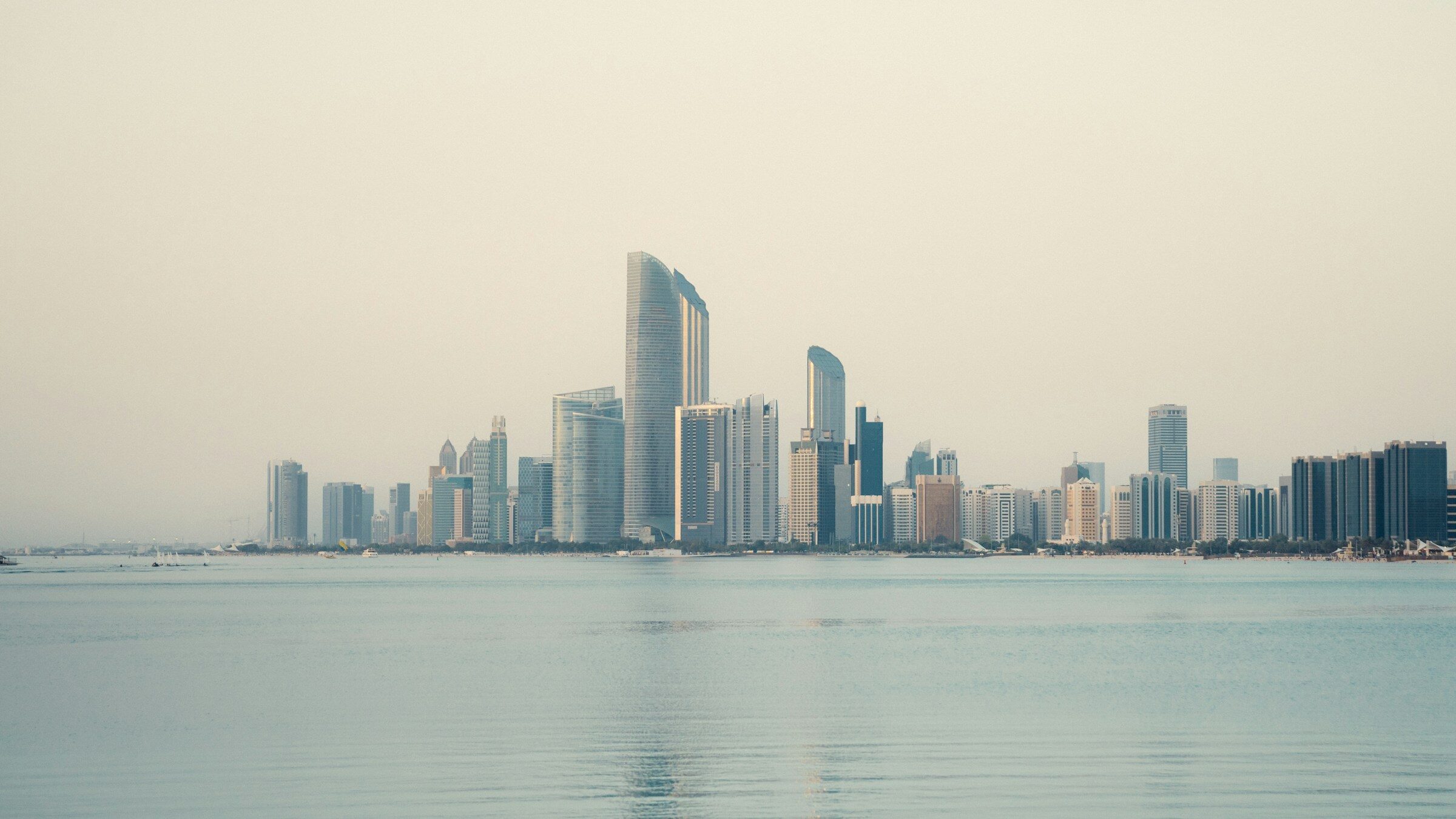 Abu Dhabi seen across a wide stretch of water
