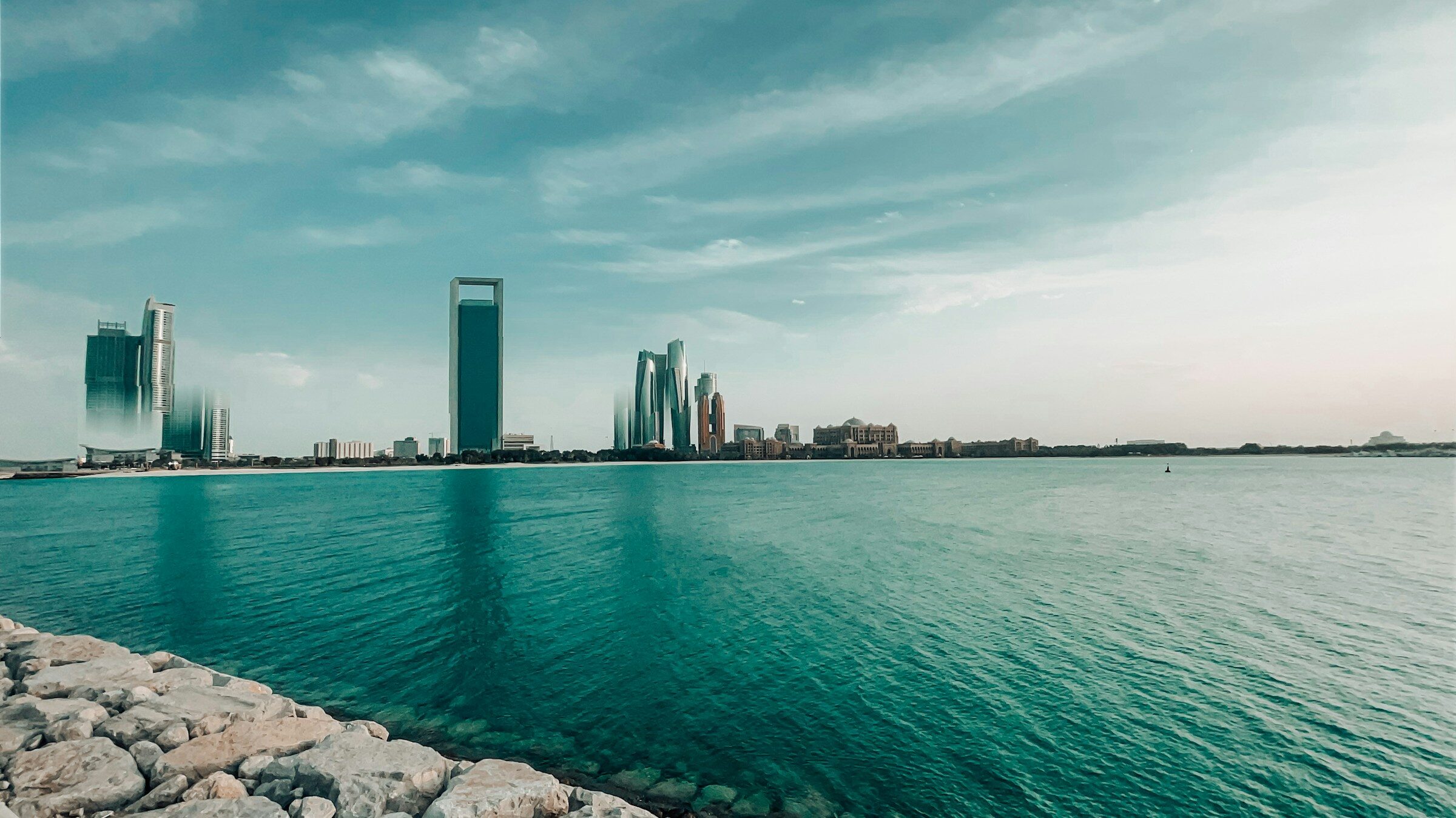 Abu Dhabi towers across the water