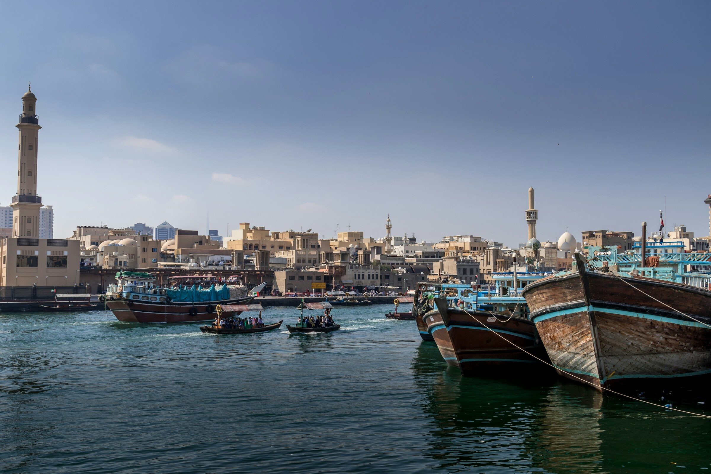 Boats moored together on Dubai Creek