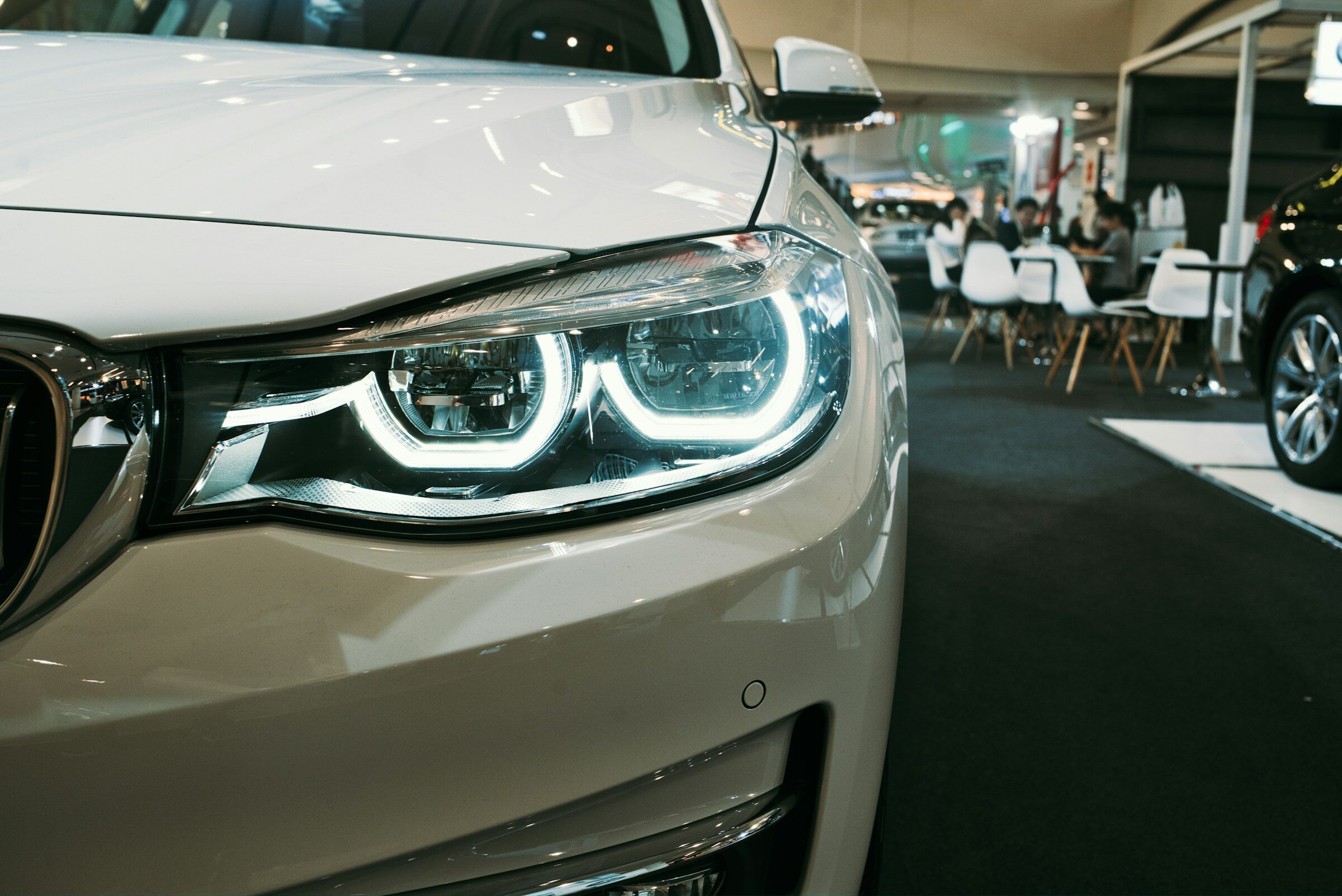 Close-up of a car on a showroom floor