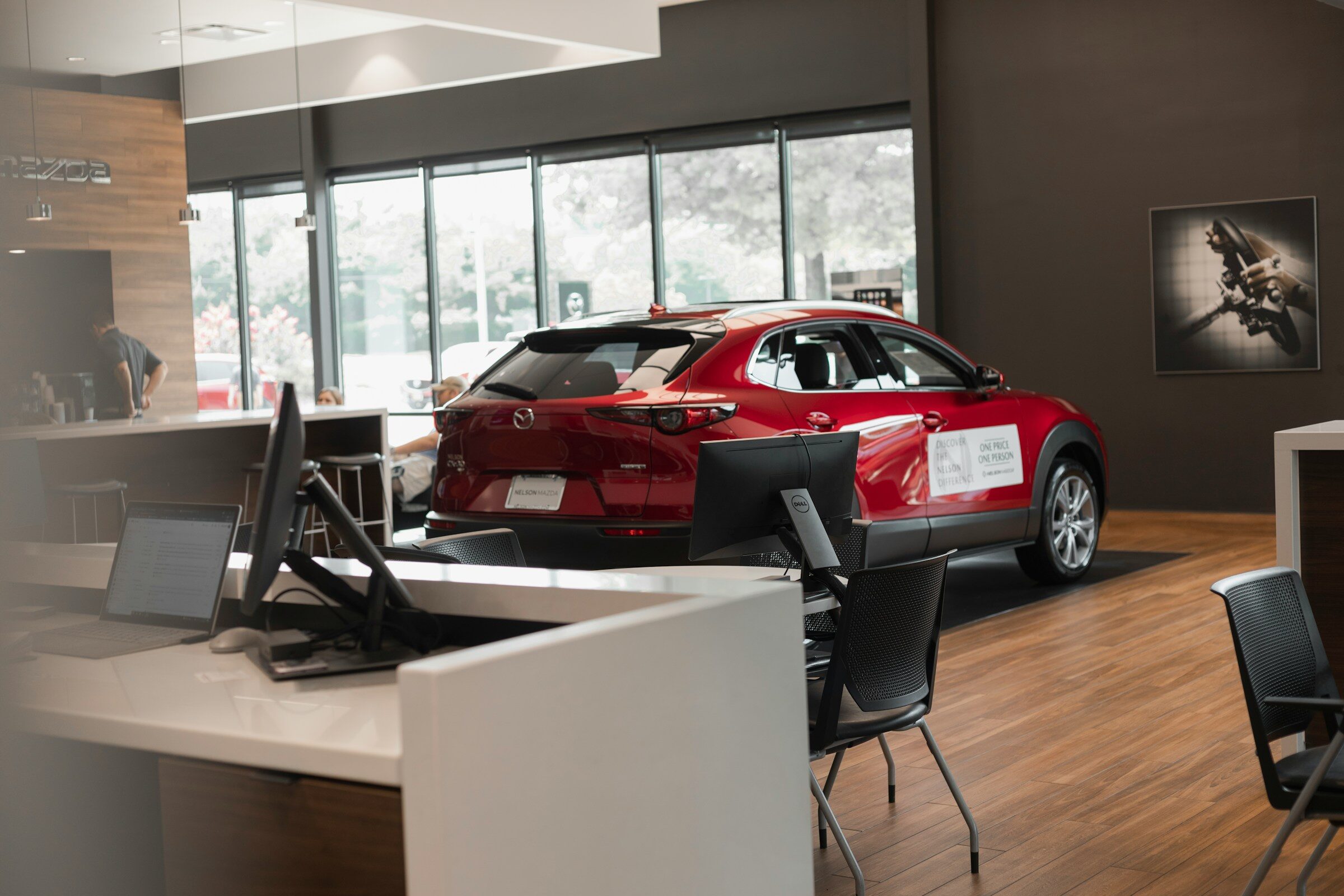 A red car parked in a showroom