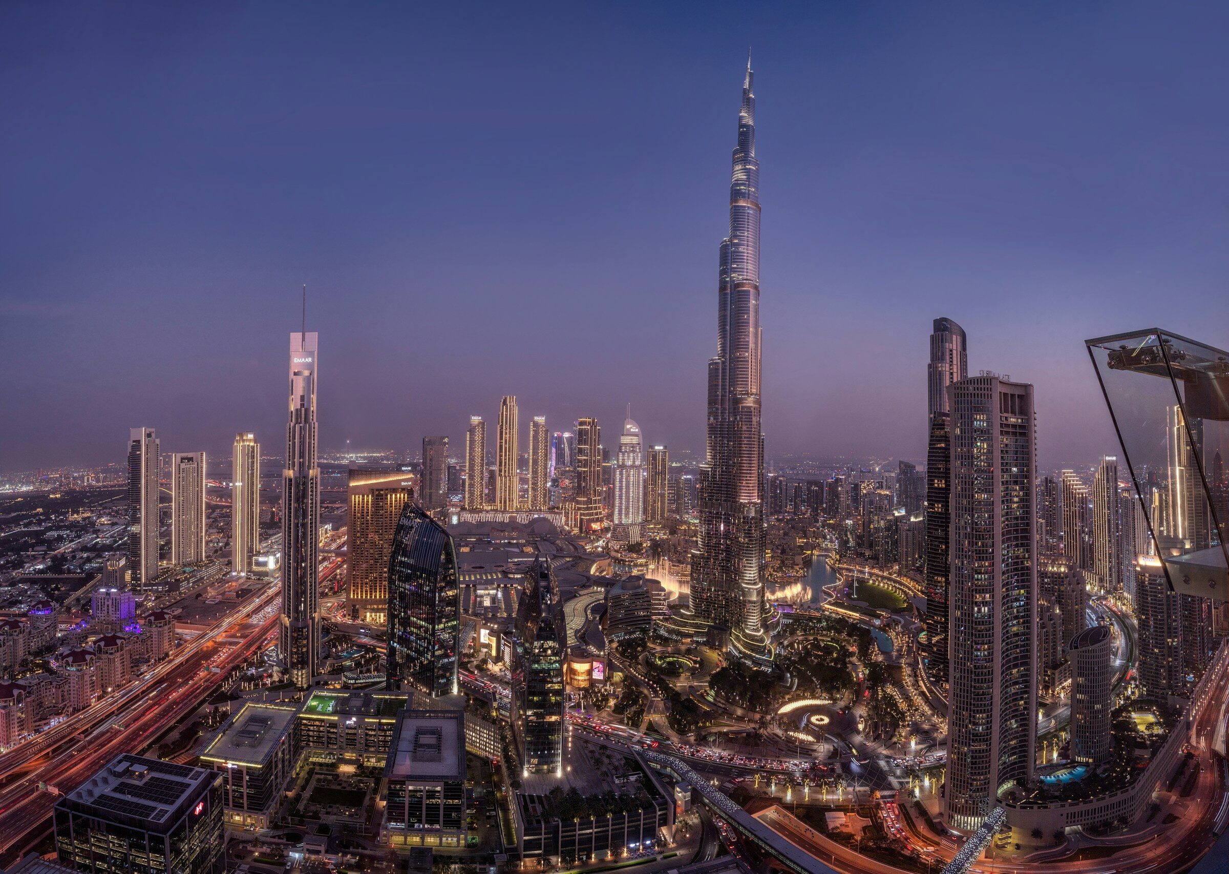 The Burj Khalifa and Downtown Dubai towers at twilight