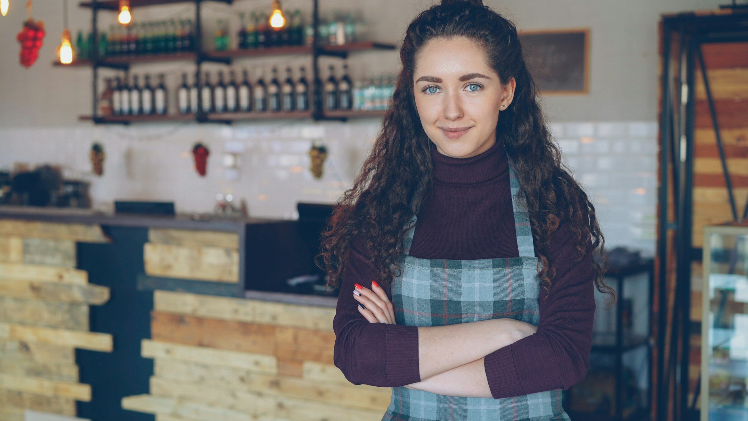 A small business owner standing in her own premises