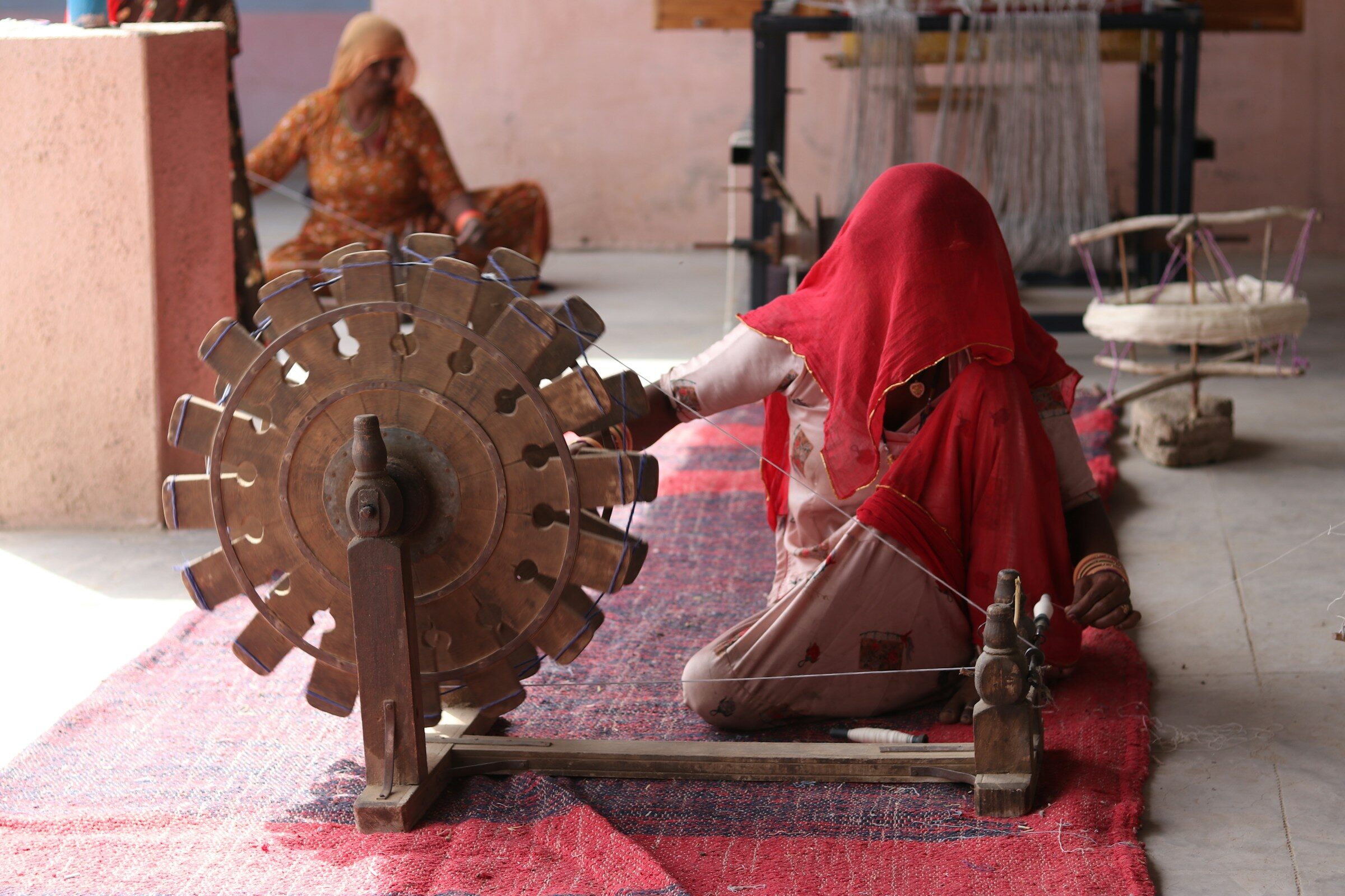 Working a machine in a textile workshop