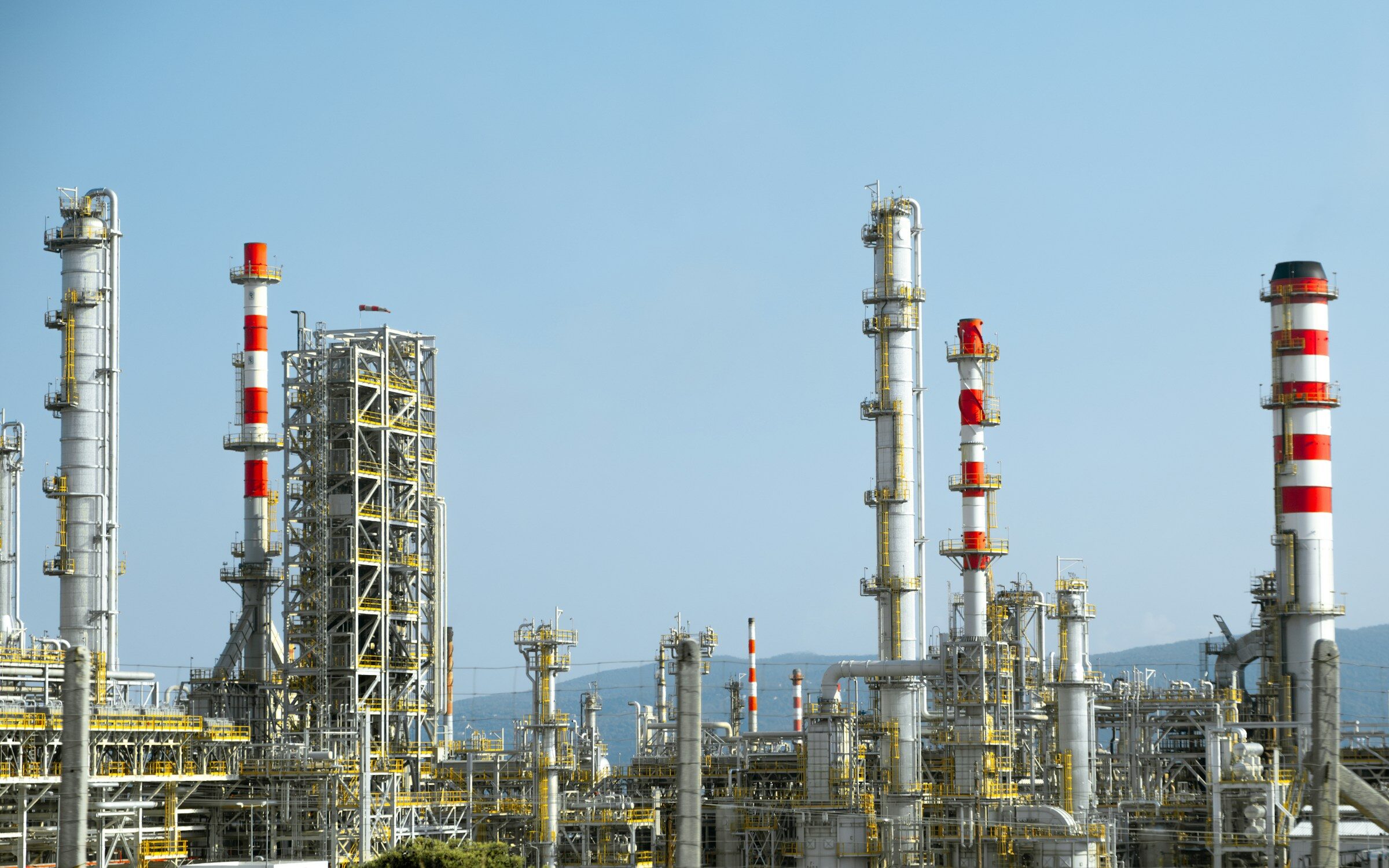 A process plant with red and white pipework