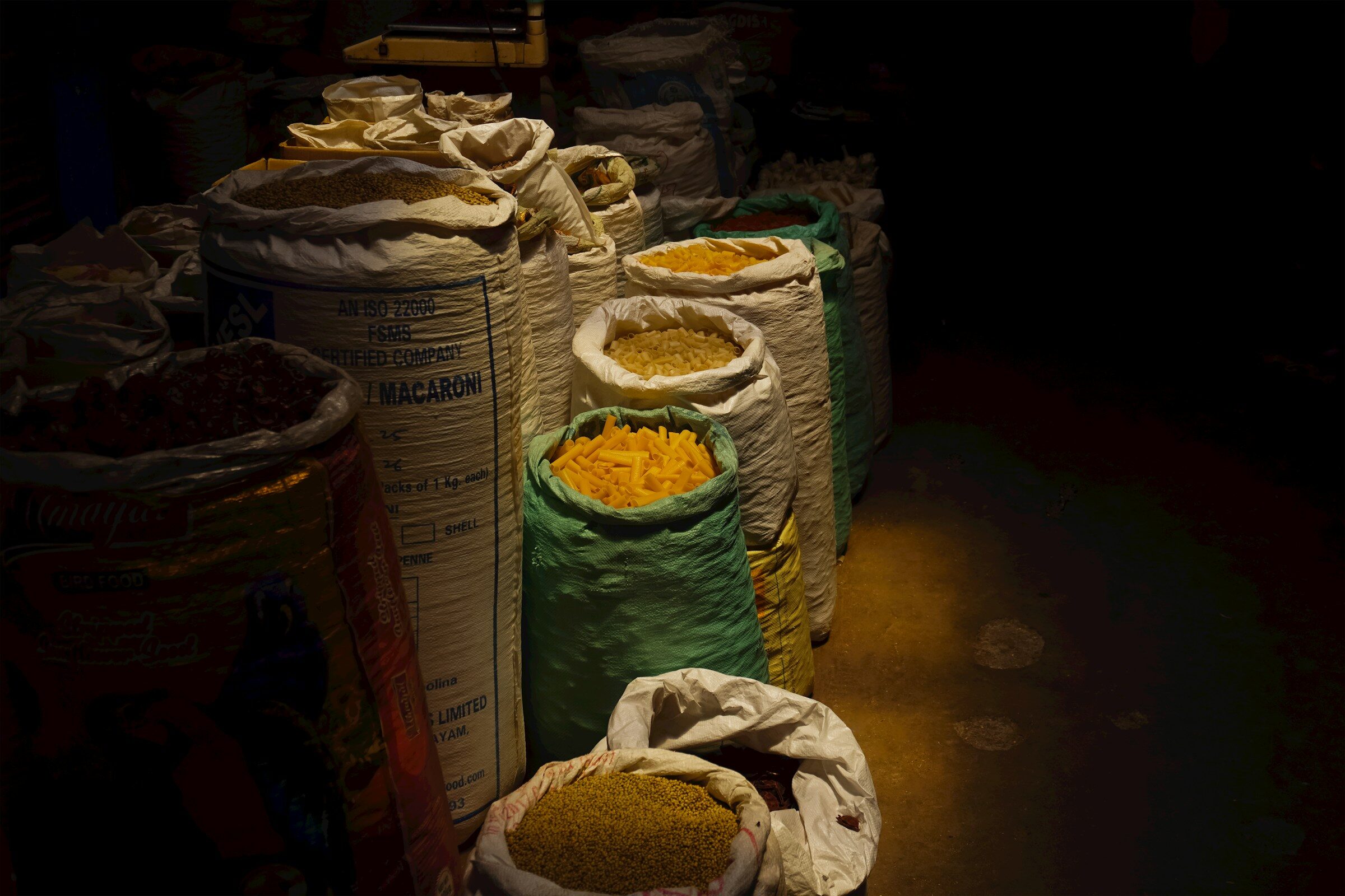 Sacks of produce in a storage godown