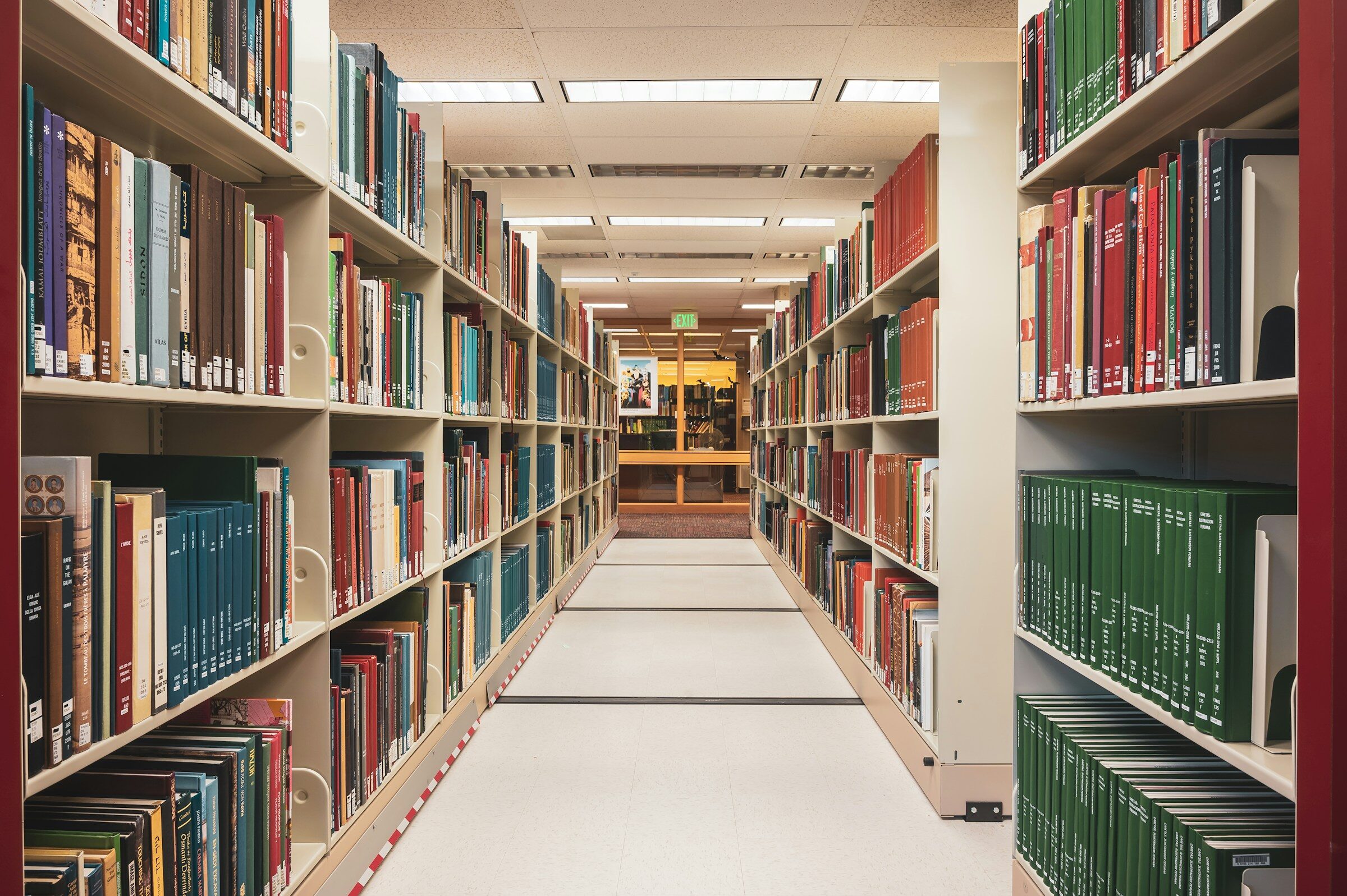 A long row of books in a library