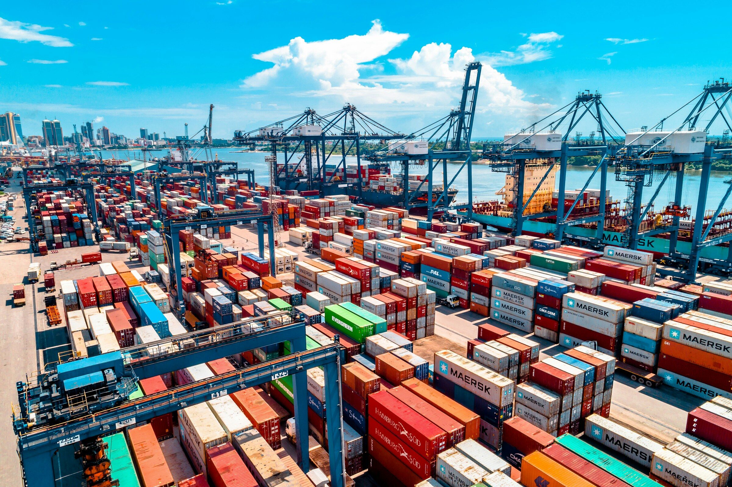 Shipping containers stacked high at a container terminal