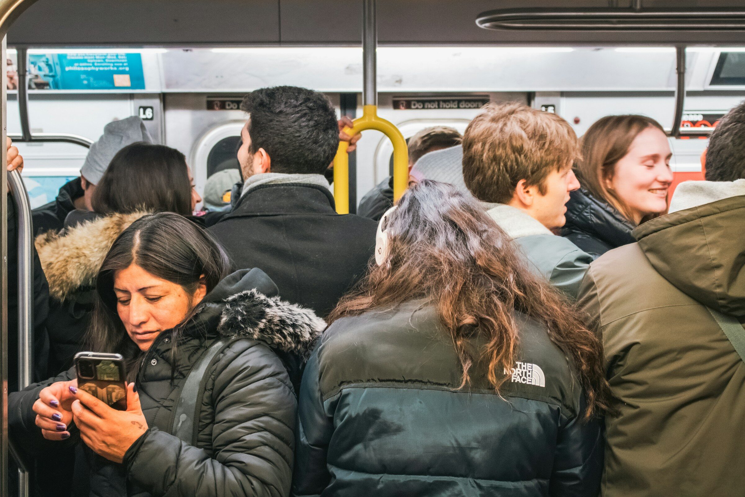A crowded commuter train carriage