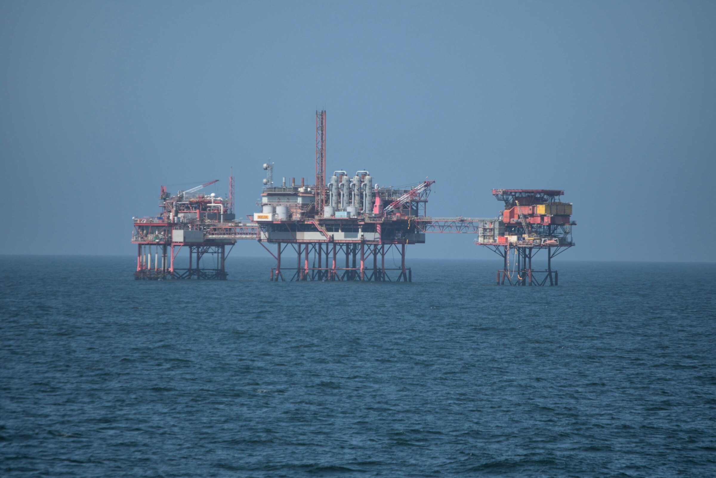 Offshore rigs standing on open water