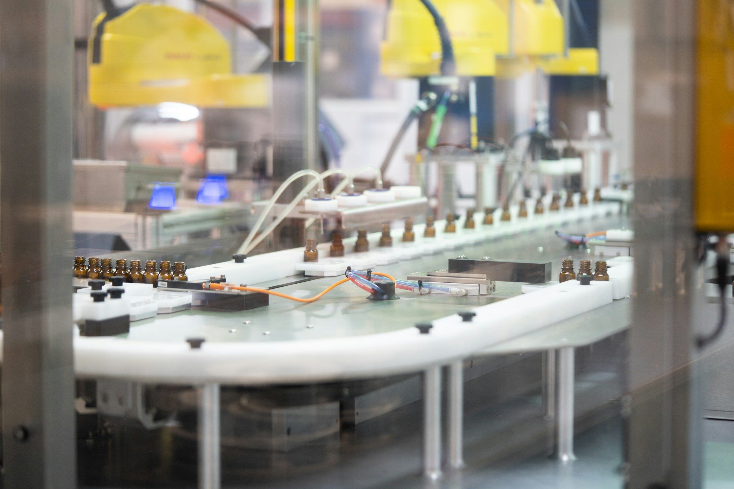 Plant machinery running on a factory floor