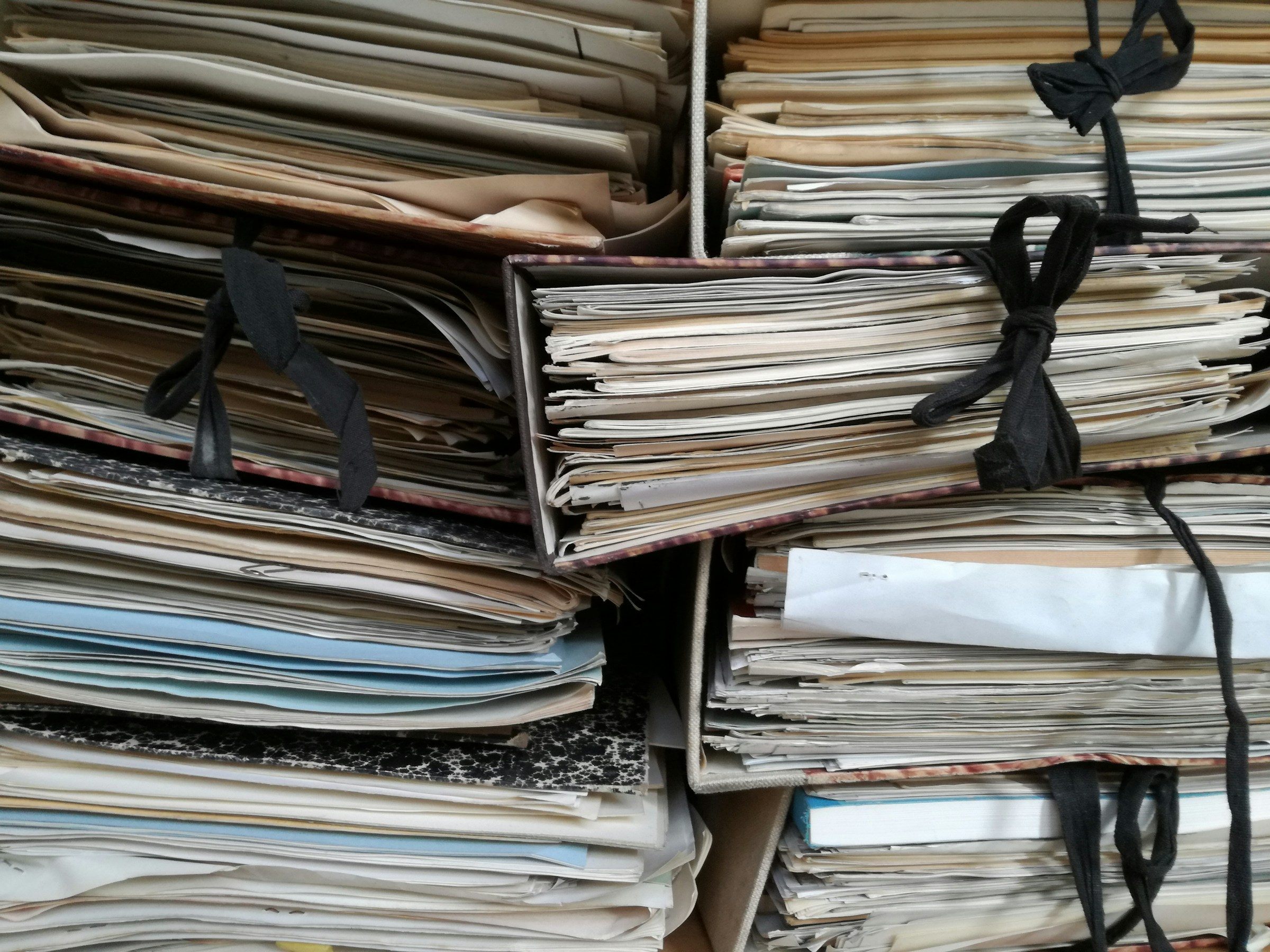 A shelf of binders
