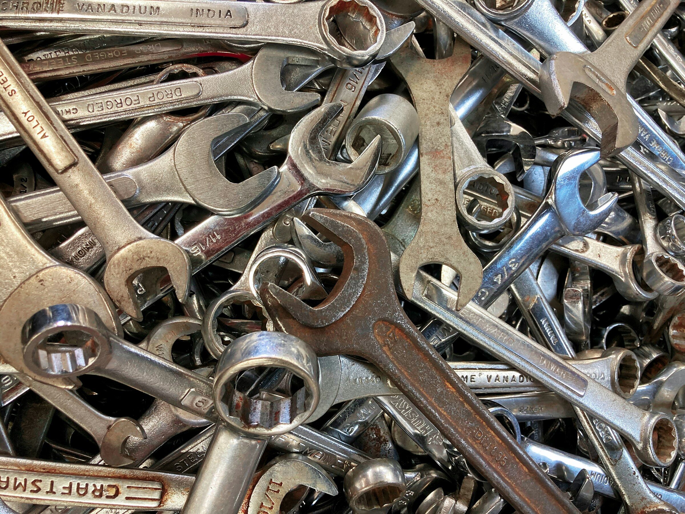 A pile of spanners side by side
