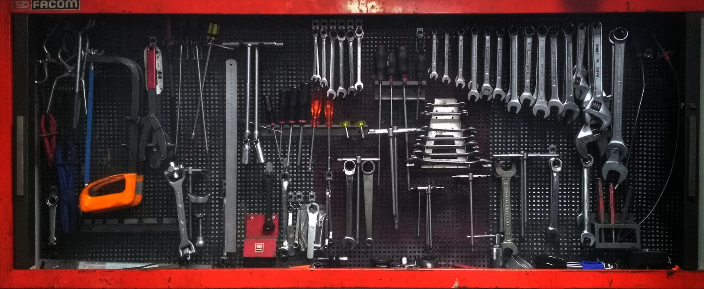 An open toolbox filled with tools