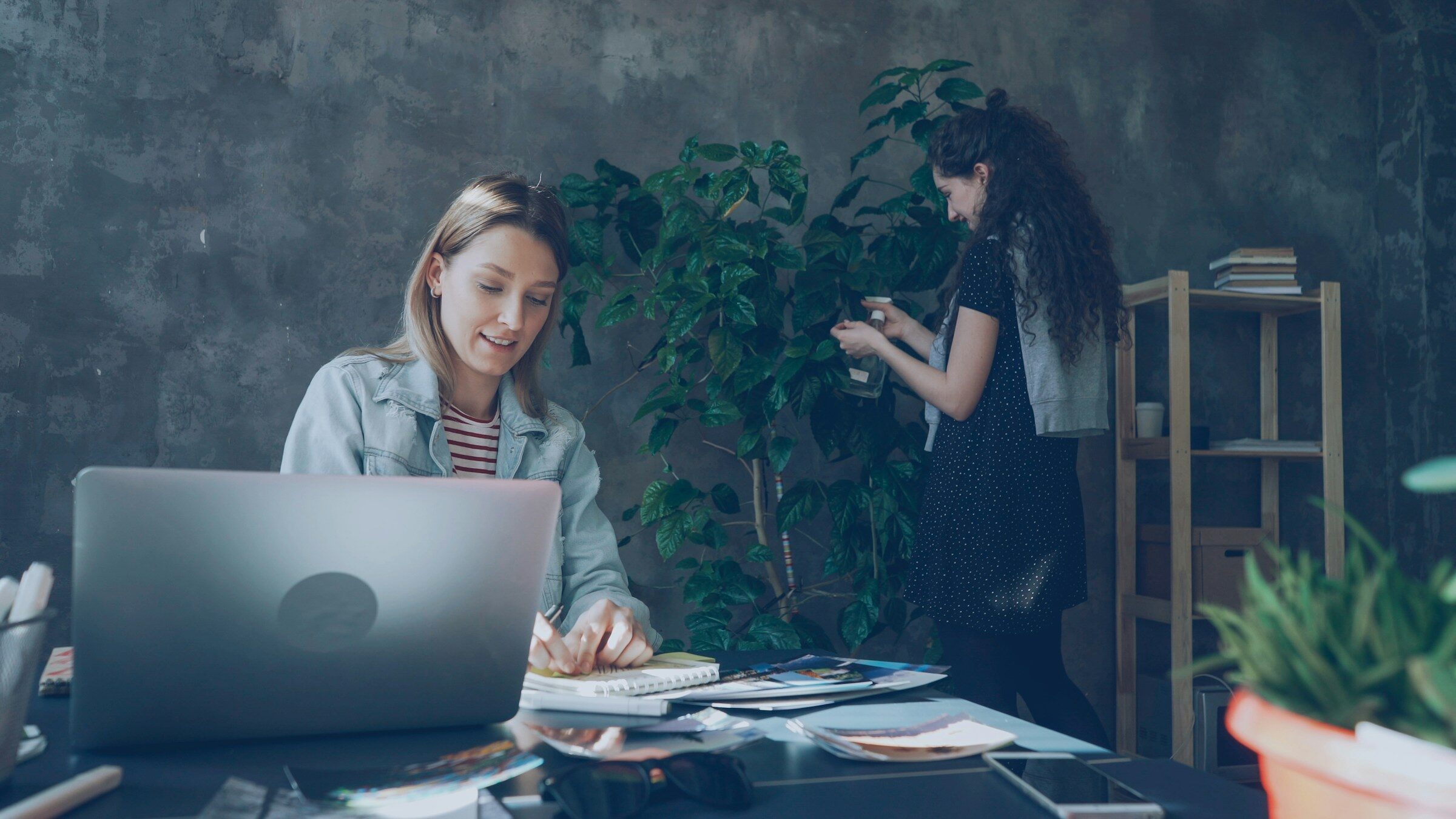 Two colleagues working together in a design and development studio